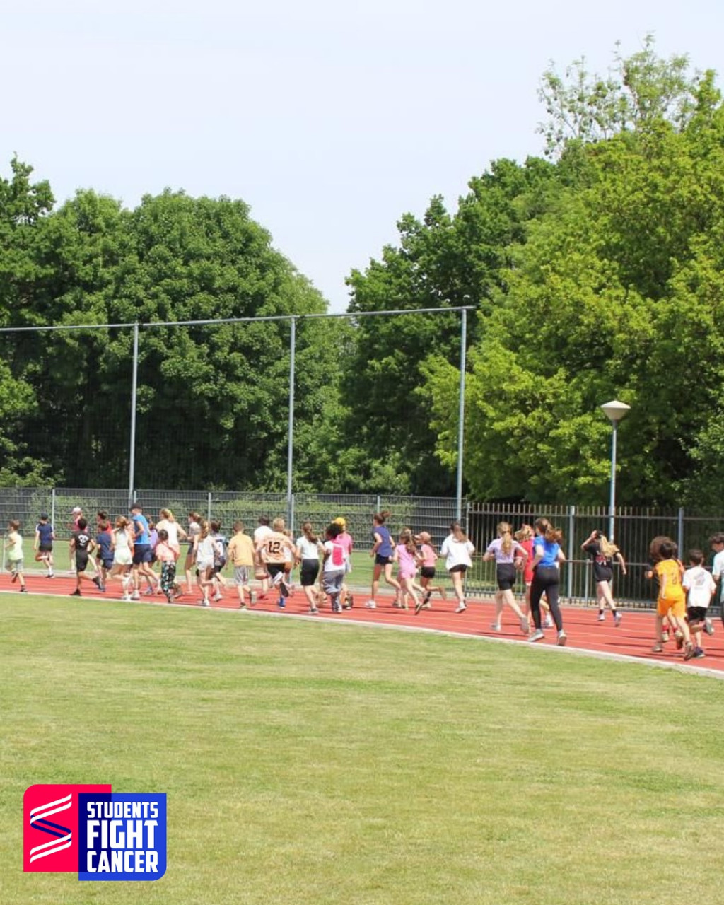 Kids Fight Cancer Run - Students Fight Cancer 400m atletiekbaan - Kankeronderzoekfonds Limburg